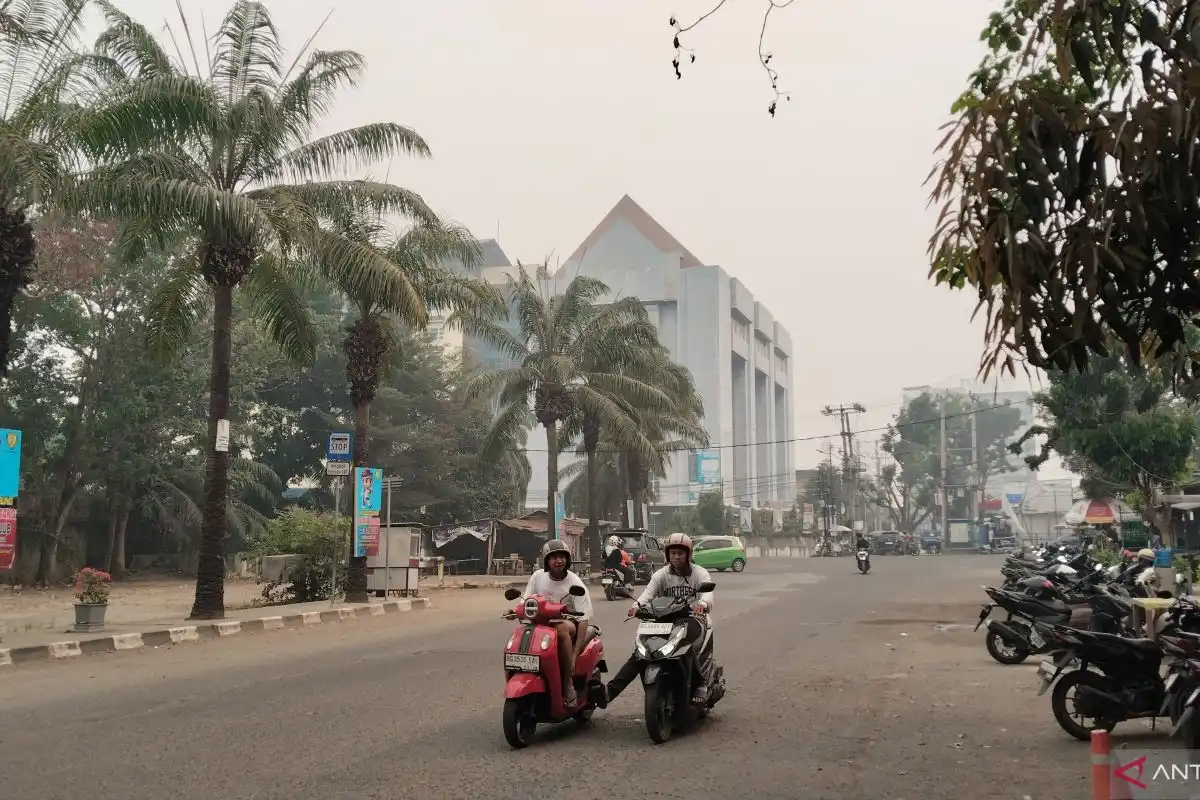 Kabut Asap Karhutla Menyelimuti Palembang, Warga Menanti Udara Kembali Lega Kabut Asap Karhutla Menyelimuti Palembang, Warga Menanti Udara Kembali Lega